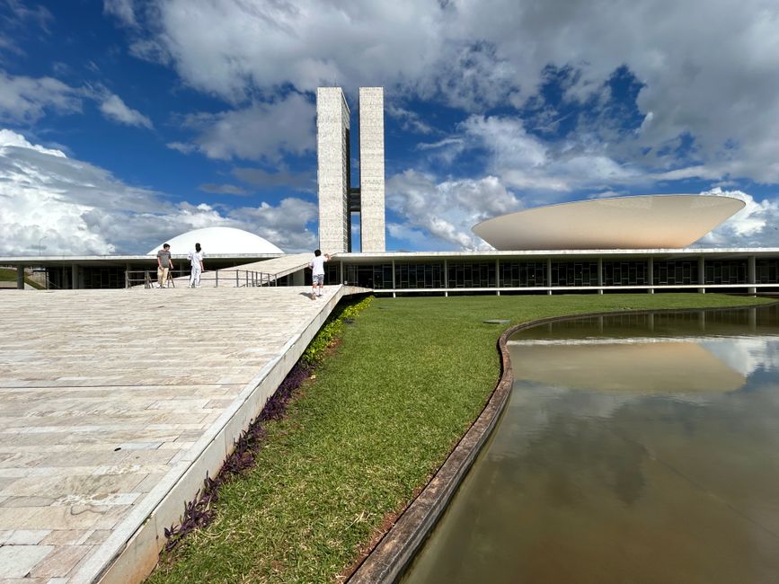 Stunning view of the National Congress of Brazil with its iconic modern architecture under a bright sky.